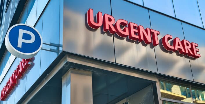 Urgent care clinic staff assisting patients